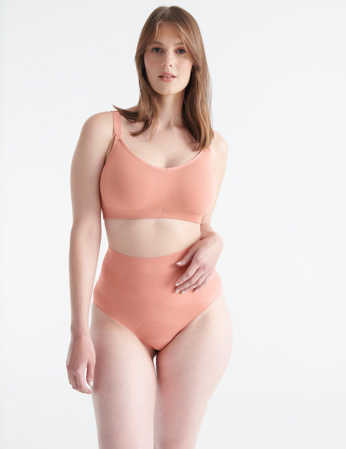 Anastasia is a 34F and wears a Knix size M+