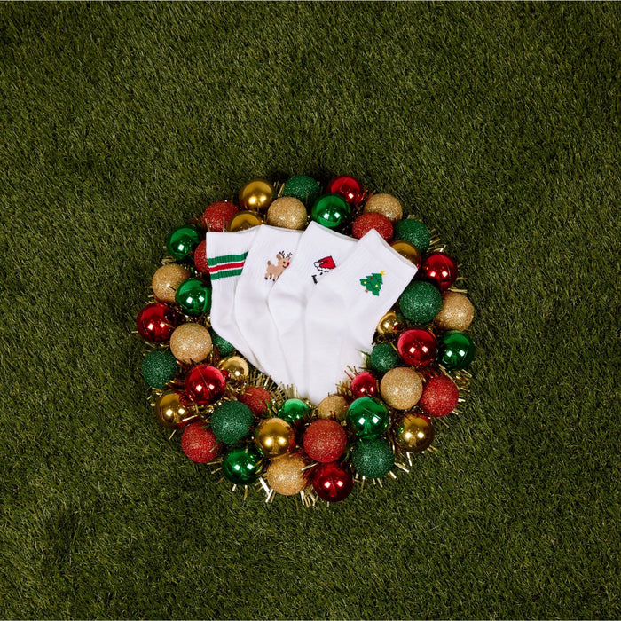 Del Campo Santa Pack golf socks featuring four Christmas designs: Santa Smiley, Rudolph Boys, Christmas Tree, and Christmas Stripe