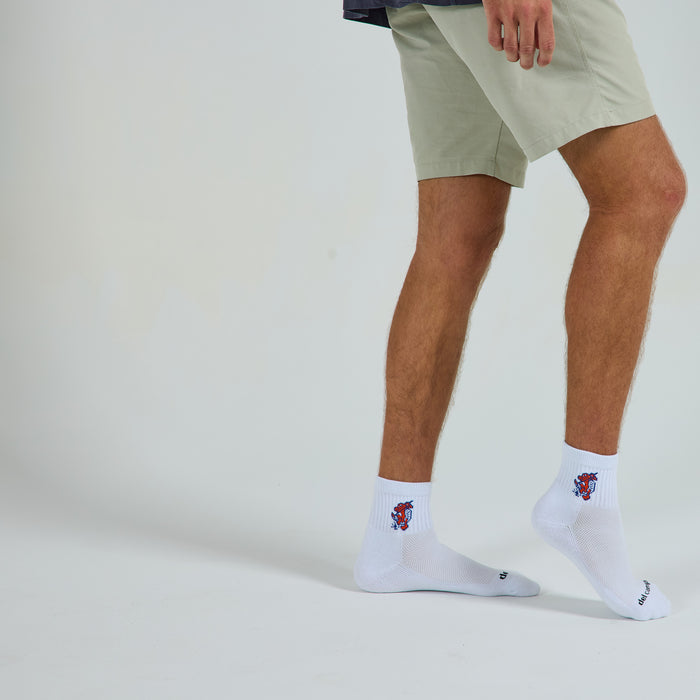 Del Campo Florida Gators Swinging Gator golf socks on a male model in studio