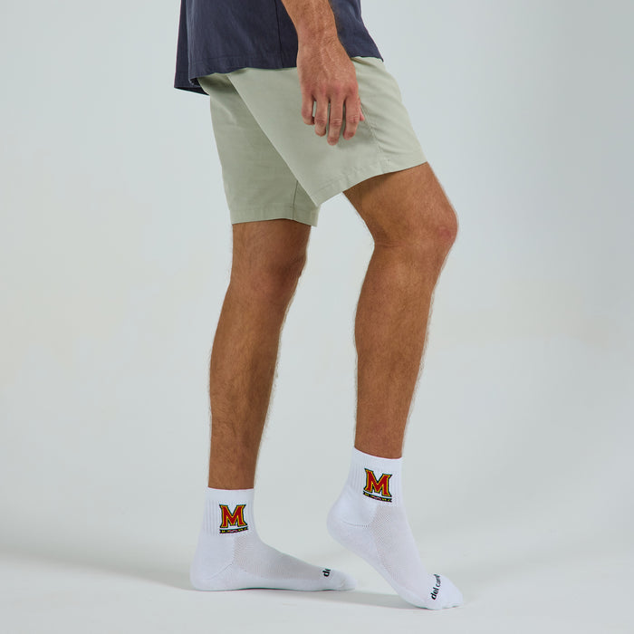 Del Campo Maryland Terrapins golf socks on a male model in studio