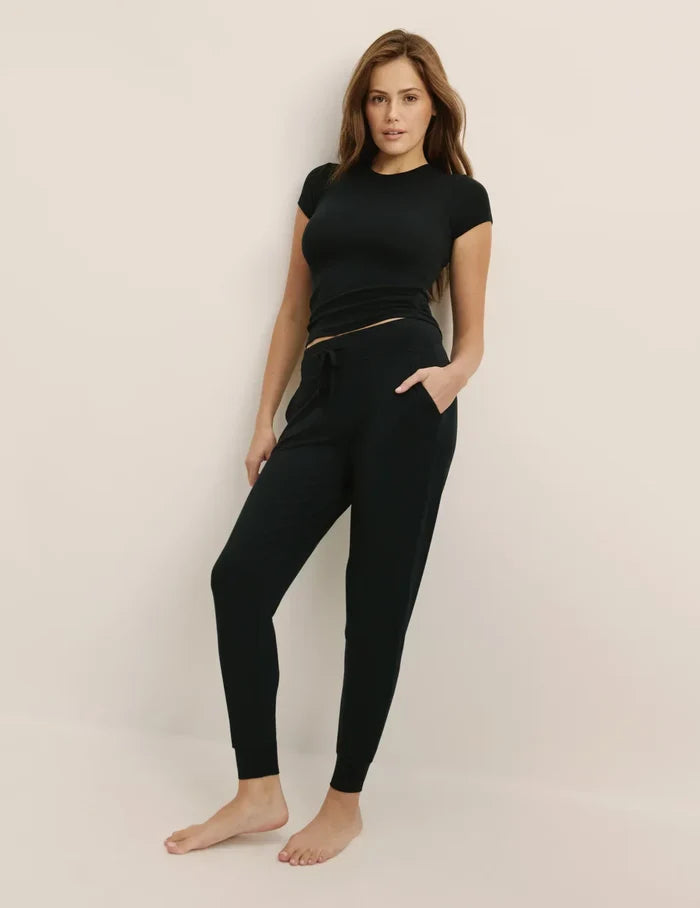 | Front view of model wearing the Modal Rib T-Shirt highlighting the coverage and fit | Black