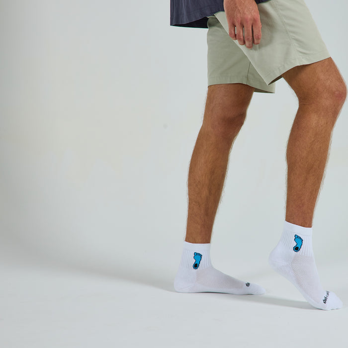 Del Campo North Carolina Tar Heel golf socks on a male model in studio