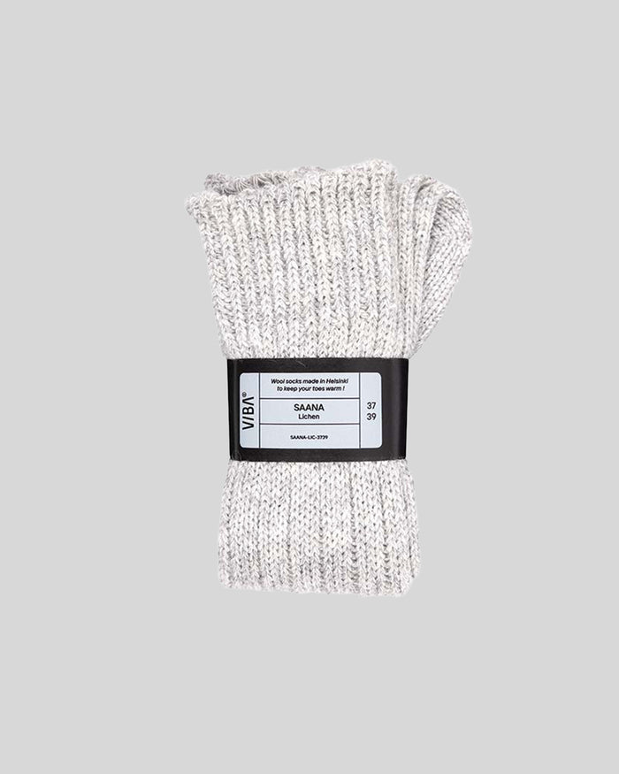 Cream-colored knit socks bundled with black label band showing SAANA Lichen branding and size 37-39.
