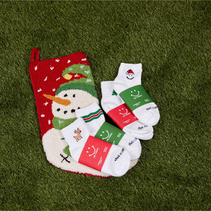 Del Campo Santa Pack golf socks featuring four Christmas designs: Santa Smiley, Rudolph Boys, Christmas Tree, and Christmas Stripe
