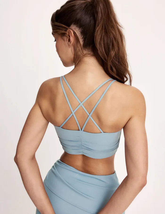 Maya is a 32A and wearing KNIX S | Blue Mist