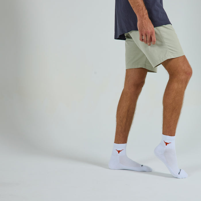 Del Campo Texas Longhorns golf socks on a male model in studio