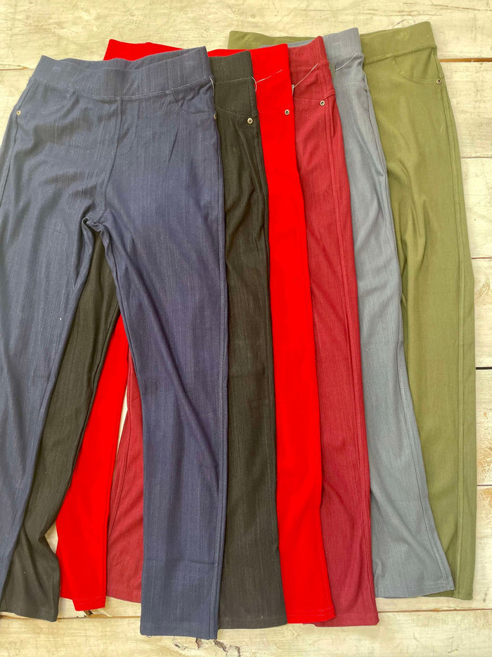 A collection of 2-pocket jeggings in various solid colors displayed side by side.