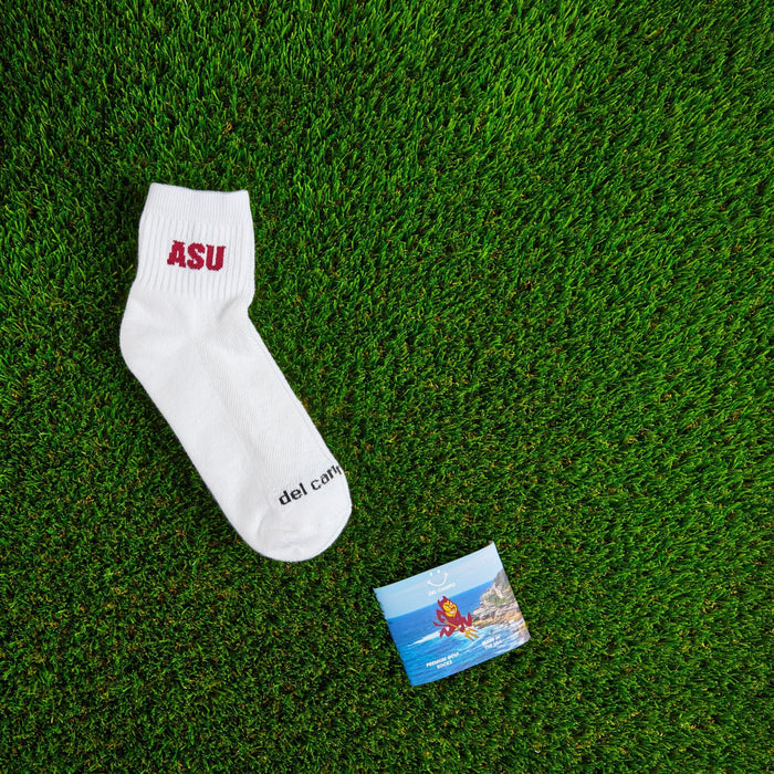 Flat lay of Del Campo Arizona State Sun Devils golf socks with game-day props