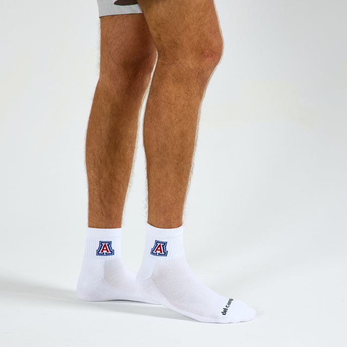 Man wearing Del Campo Arizona Wildcats golf socks, studio shot, no shoes