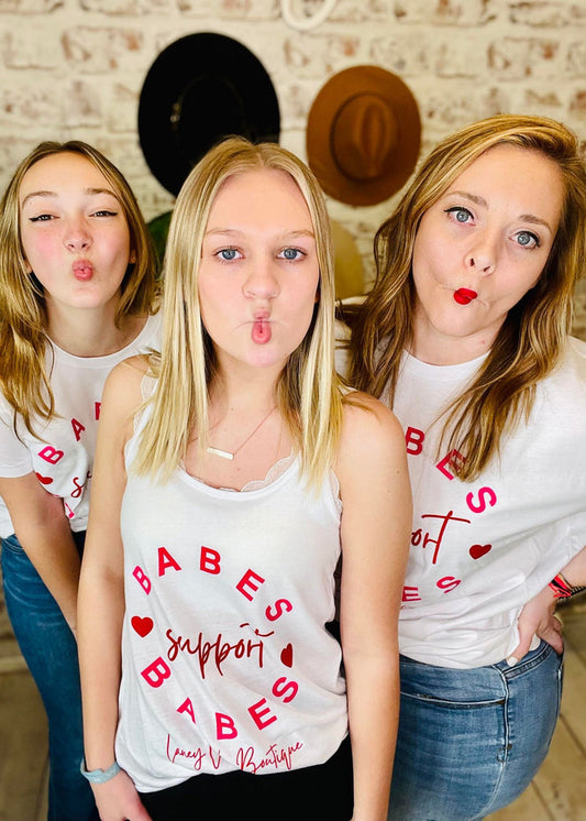 Women wearing White Laney Lu's Shirt with Pink Lettering