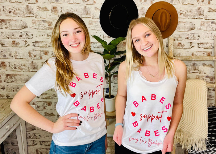 Women wearing White Laney Lu's Shirt with Pink Lettering