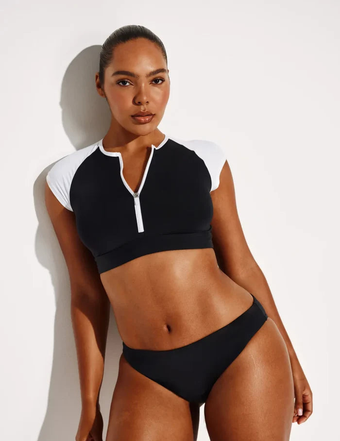 | Front view of model highlighting the coverage and fit | Black