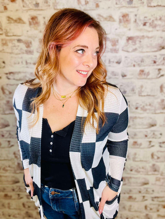 Black and white large checkers buttonless long sleeve cardigan