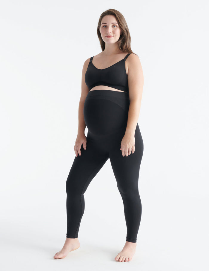Ashleigh wears a size L | Front view of model wearing the BlissFit™ Maternity Legging highlighting the coverage & fit | Black