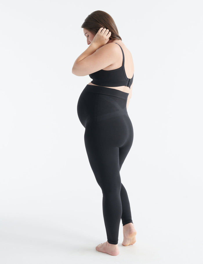 Ashleigh wears a size L | Front view of model wearing the BlissFit™ Maternity Legging highlighting the coverage & fit | Black