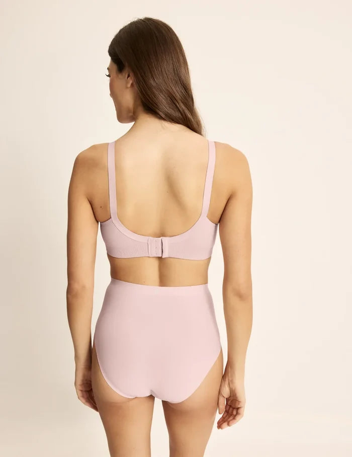 Sofia is 32D and wears a Knix size S+ | Back view of model wearing the BlissFit™ Nursing/Pumping Bra, highlighting the neckline, nursing clip strap design, and smooth silhouette | Rose Water
