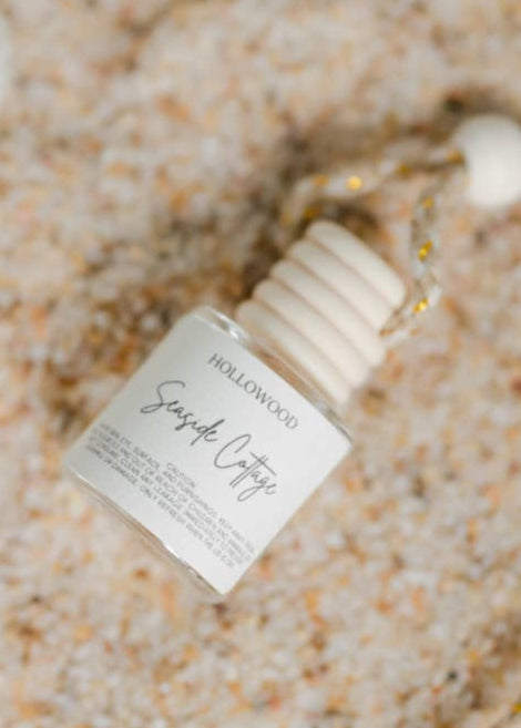Experience the fresh, invigorating scents of spring every time you drive with our Spring Car Diffusers. Simply attach to your car's review and let the natural fragrances diffuse throughout your vehicle. How to use: Remove the wooden lid and place it to the side. Remove the plastic lid from the container, carefully place the wooden lid back on, and tilt the bottle upside down for a few seconds.&nbsp; Refresh the scent only when lid is dry. Caution: This product contains oil. Avoid skin, eye, surf