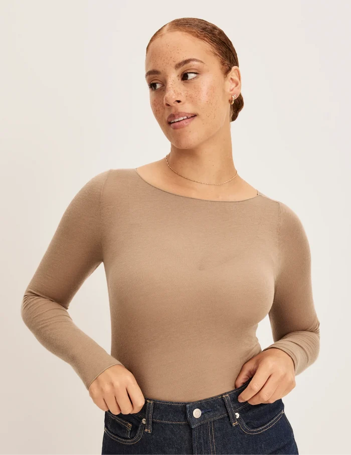 | Front view of model wearing the Cashmere Mist Boatneck Top highlighting the neckline and fit | Cashew