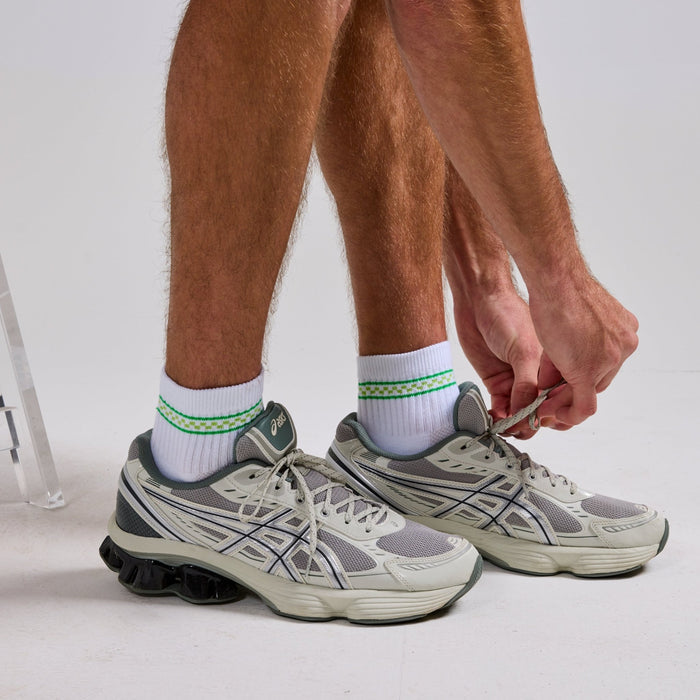 Del Campo Checkered Stripe Pack golf socks featuring all four checkered stripe colorways: pink, blue, green, and black/grey