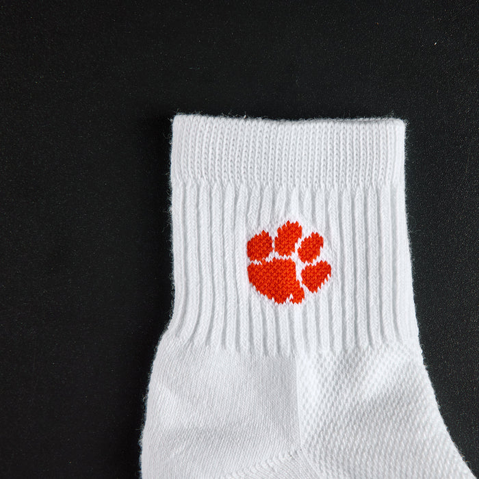 Close-up of the orange tiger paw on Del Campo Clemson Tigers golf socks
