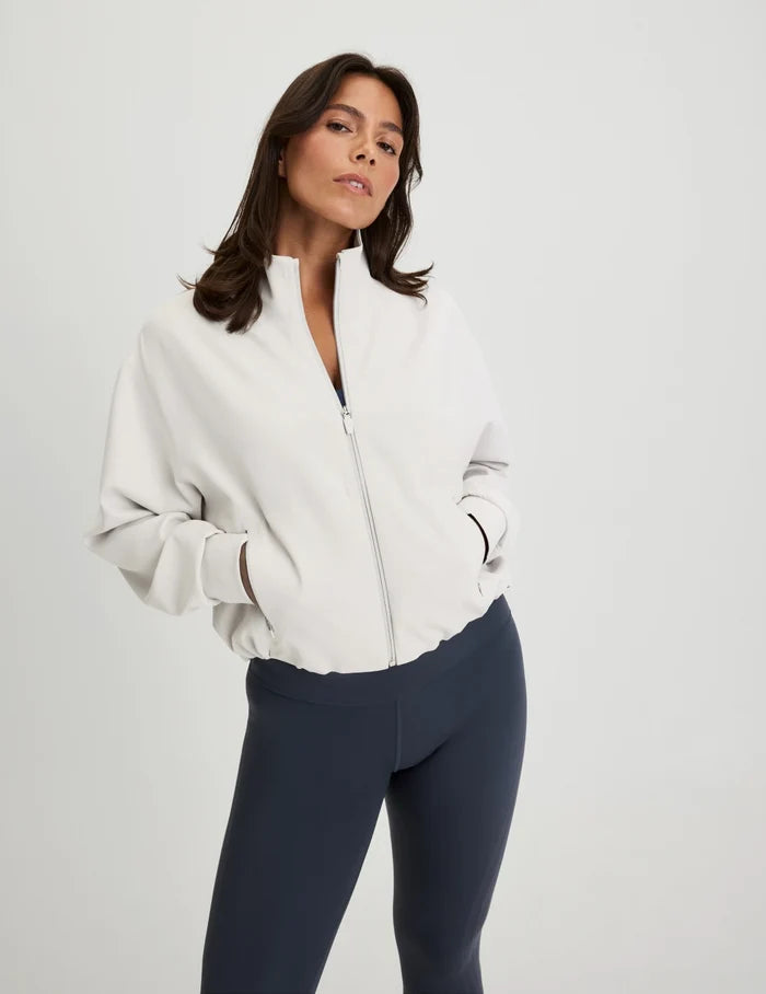 | Front view of model wearing the CloudCut™ Bomber highlighting the coverage and fit | Sphere
