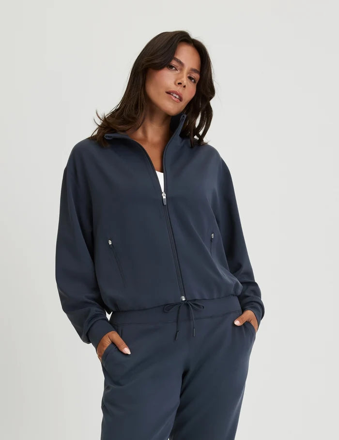 | Front view of model wearing the CloudCut™ Bomber highlighting the coverage and fit | Twilight Navy