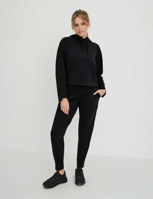 | Front view of model highlighting the coverage and fit | Black