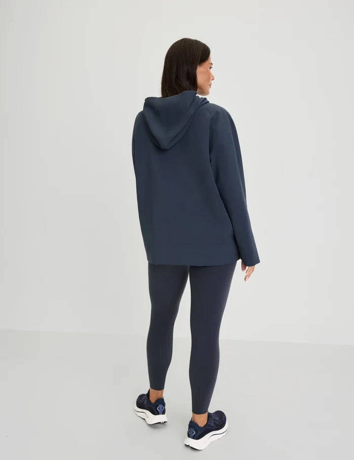 | Back view of model wearing the CloudCut™ Hoodie highlighting the coverage and fit | Twilight Navy