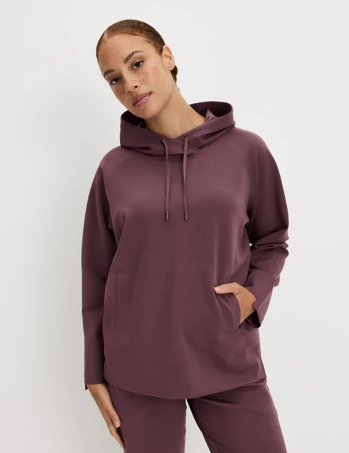 | Front view of model wearing the CloudCut™ Hoodie highlighting the coverage and fit | Dahlia