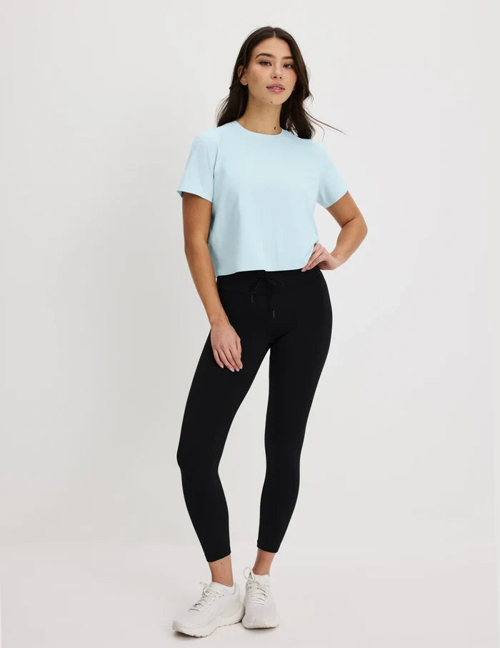 | Front view of model wearing the CloudCut™ Legging highlighting the coverage and fit | Black