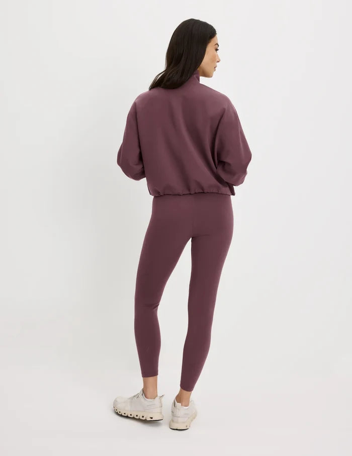 | Back view of model wearing the CloudCut™ Legging highlighting the coverage and fit | Dahlia