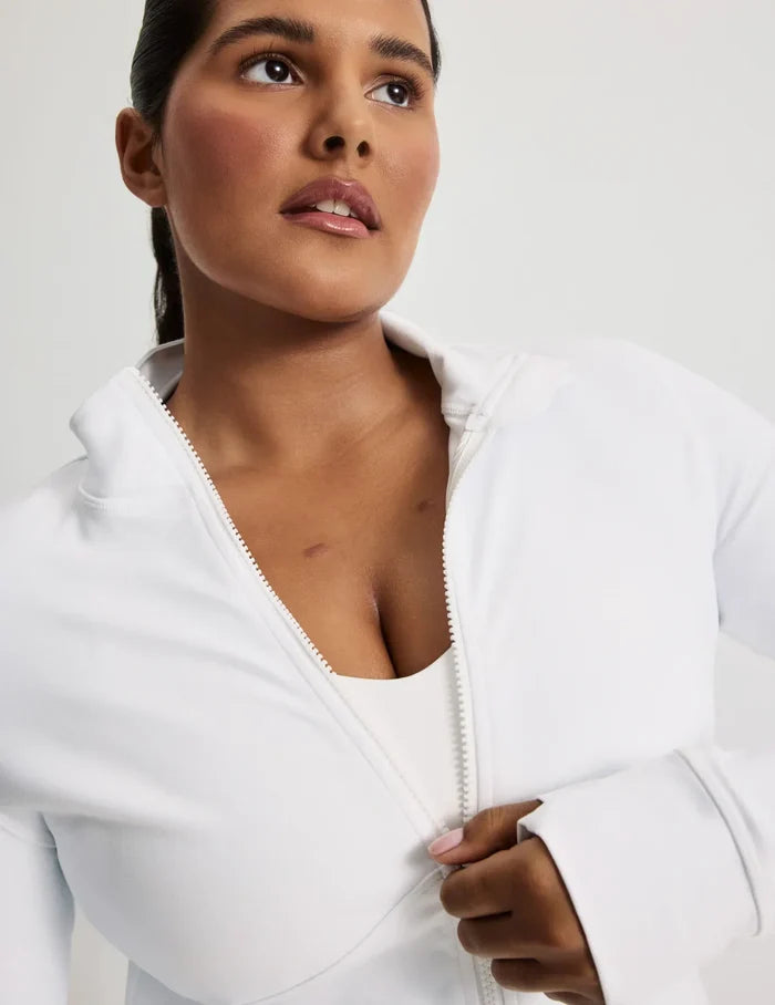 Adiya is 5’6, a 36C and wears a size L | White