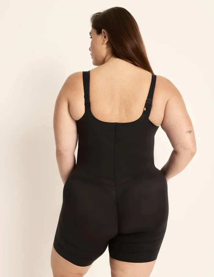 Clementine is a 40G, has 51" hips, is 5'9.5" tall and wears a size XXL  | Back view of model wearing the Customizable Open Bust Shaper Bodysuit highlighting the coverage and smooth fit | Black