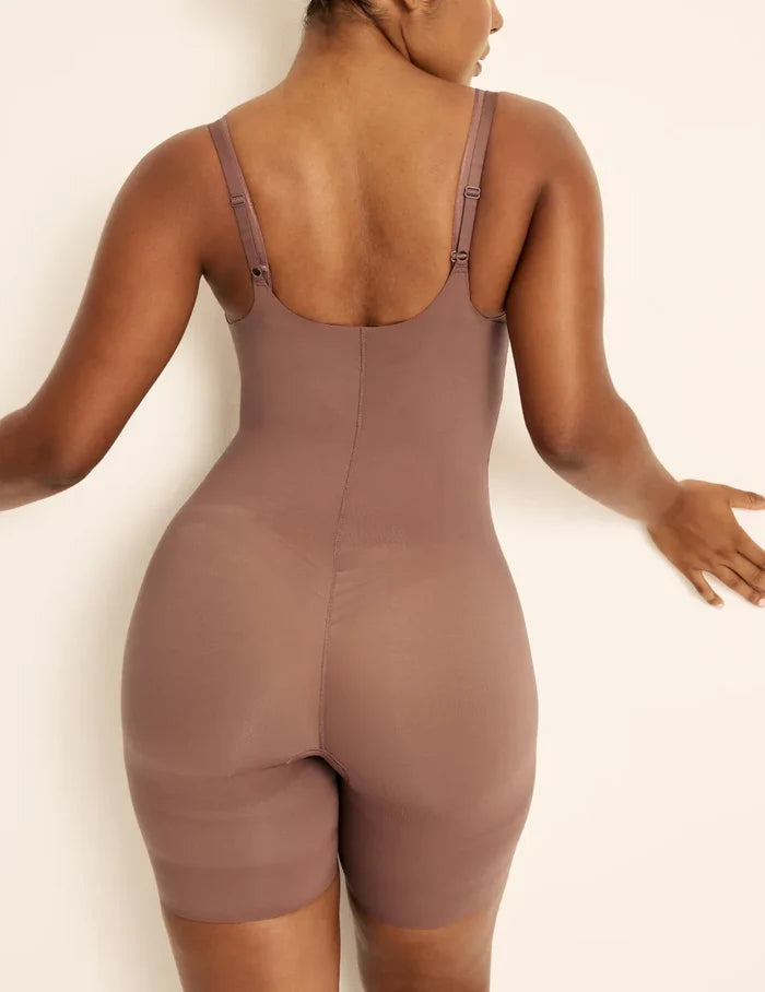 Amber is a 36C, has 46” hips, is 5’10.5” tall and wears a size L  | Back view of model wearing the Customizable Open Bust Shaper Bodysuit highlighting the coverage and smooth fit | Sola