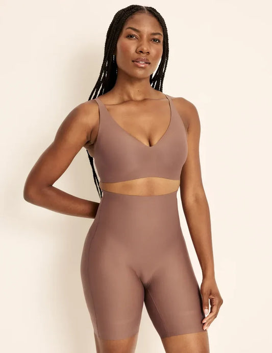 Gin has 38” hips, is 5’8” tall and wears a size S  | Front view of model wearing the Customizable Shaper High Rise Leakproof Shorts, highlighting the coverage and smooth fit | Sola