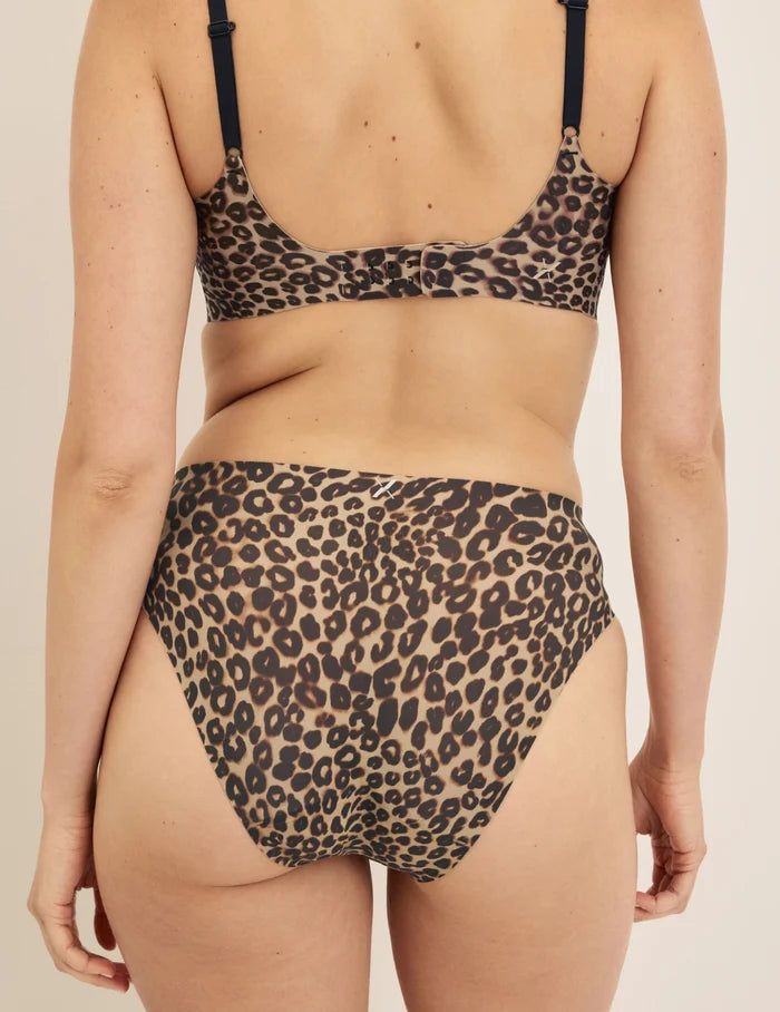 | Back view of model wearing the Essential No-Show French Cut highlighting the coverage and smooth fit | Cheetah Print