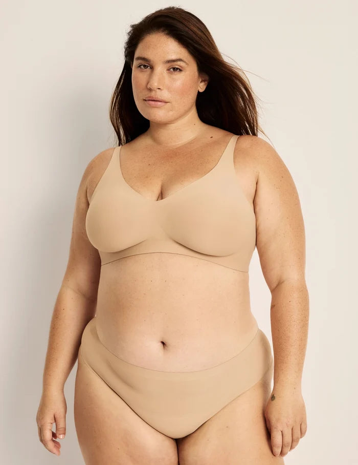 | Front view of model wearing the Essential No-Show Thong highlighting the coverage and smooth fit | Nude Multi