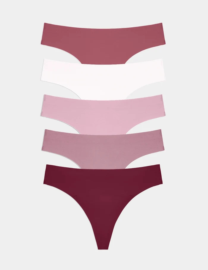 | Essential No-Show Thong 5-Pack shown front-facing against a light gray background | Pink Multi