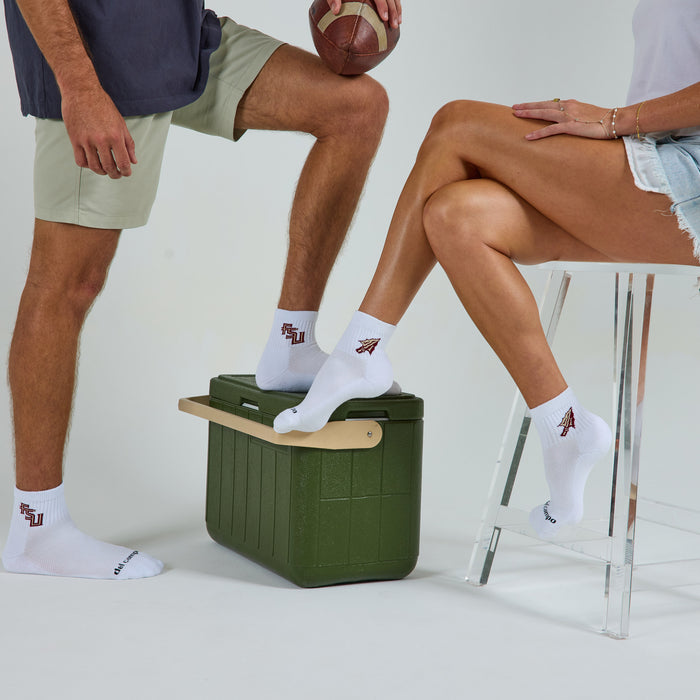 Del Campo Florida State Pack golf socks on a male and female model