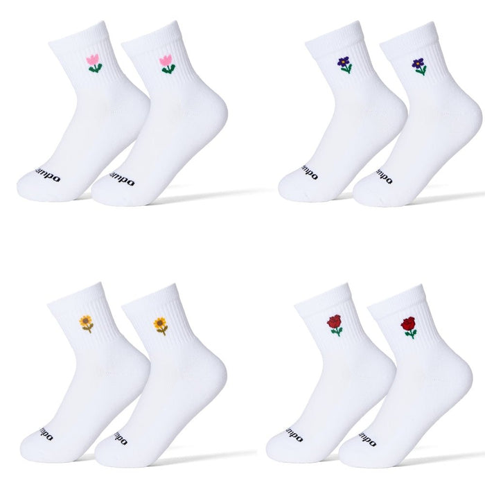 Del Campo Flower Pack golf socks featuring four floral designs: rose, sunflower, violet, and pink tulip