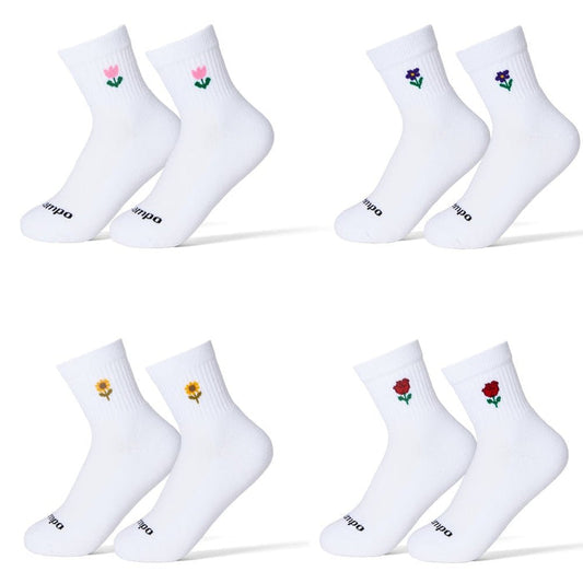 Del Campo Flower Pack golf socks featuring four floral designs: rose, sunflower, violet, and pink tulip