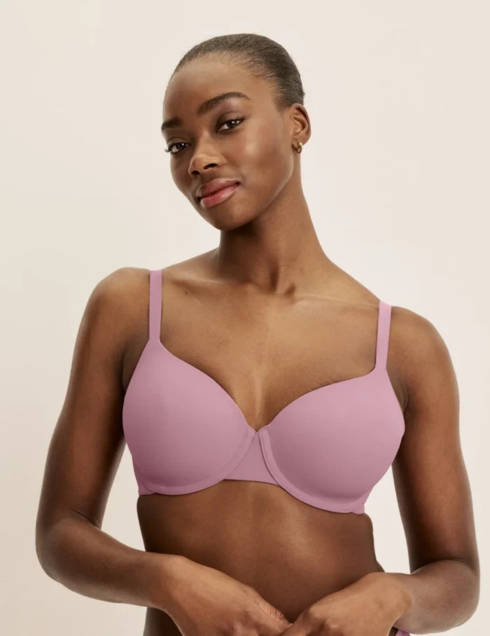 Orlane is wearing a 32DD | Front view of model wearing the FreeFlex™ Demi Bra, highlighting the neckline, strap design, and  silhouette | Dusty Pink