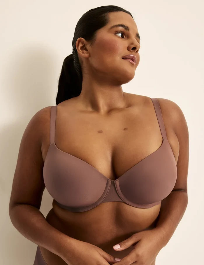 Adiya is wearing a 36C | Front view of model wearing the FreeFlex™ Demi Bra, highlighting the neckline, strap design, and  silhouette | Sola