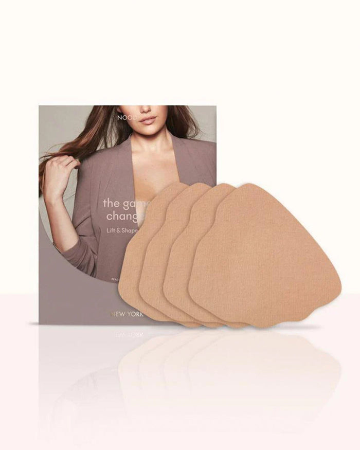 | Game Changer Lift and Shape Adhesive Bra packaging shown front-facing against a light gray background | No. 5 Soft Tan