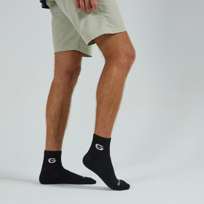 Man wearing Del Campo Georgia Night Mode golf socks, studio shot, no shoes