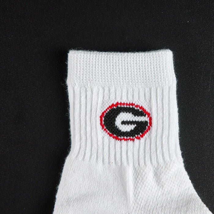 Close-up of the black G in a red oval on Del Campo Georgia Bulldogs golf socks