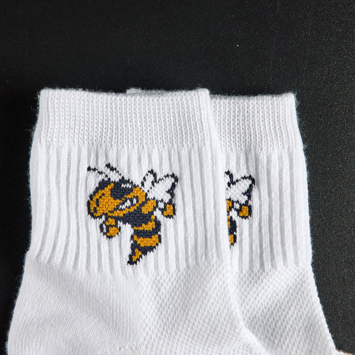 Close-up of Buzz the yellowjacket on Del Campo Georgia Tech Buzz golf socks