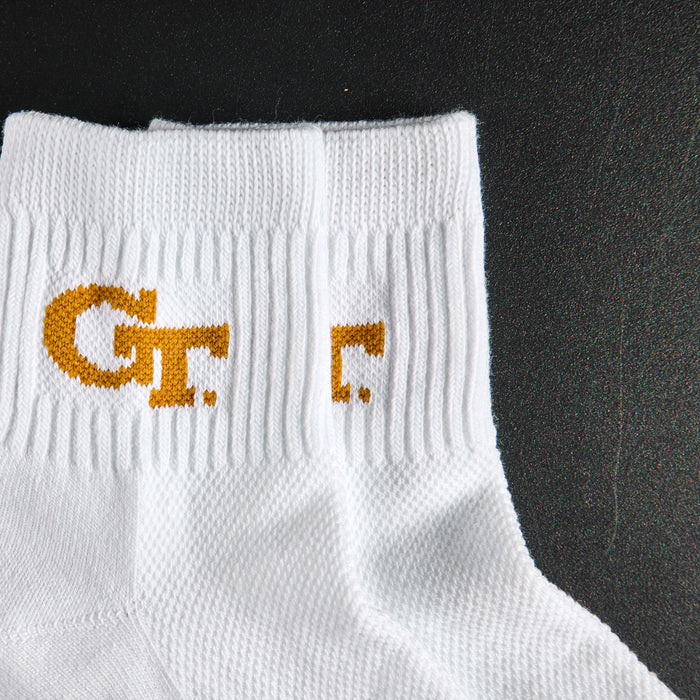 Close-up of the old gold GT interlock on Del Campo Georgia Tech GT golf socks