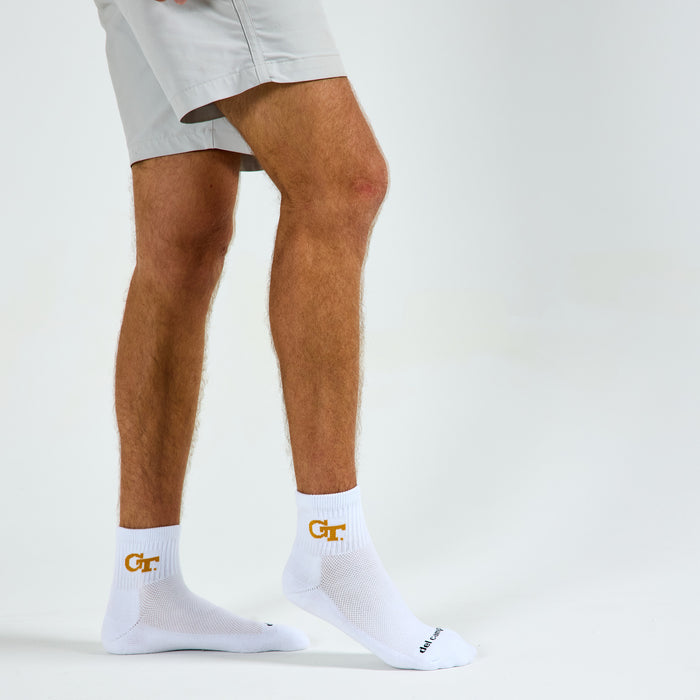 Man wearing Del Campo Georgia Tech GT golf socks, studio shot, no shoes