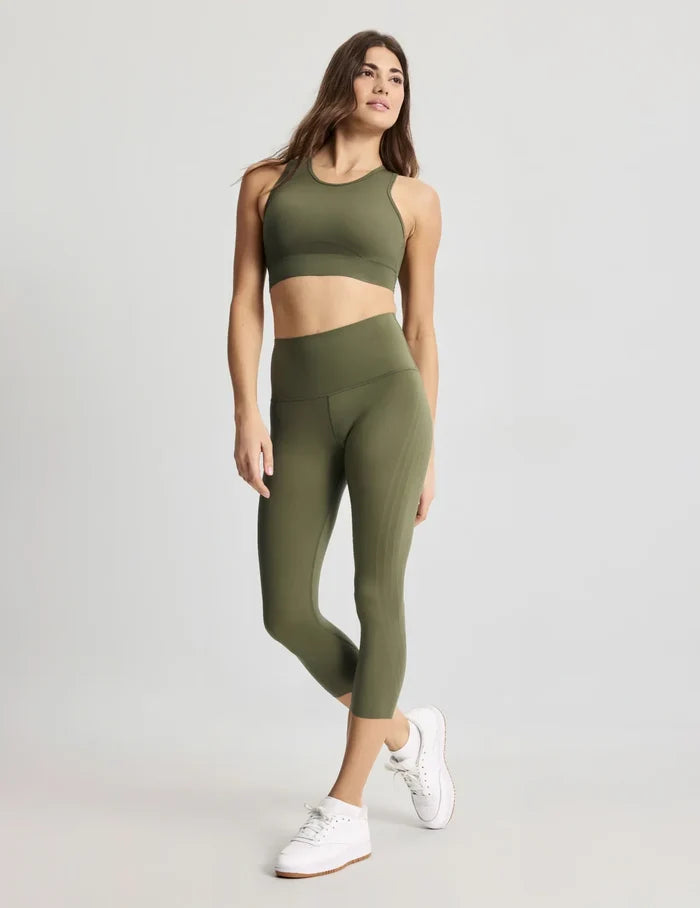 | Front view of model highlighting the coverage and fit | Olive